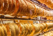 ارتفاع طفيف في أسعار الذهب رغم تراجع الأوقية عالميًا